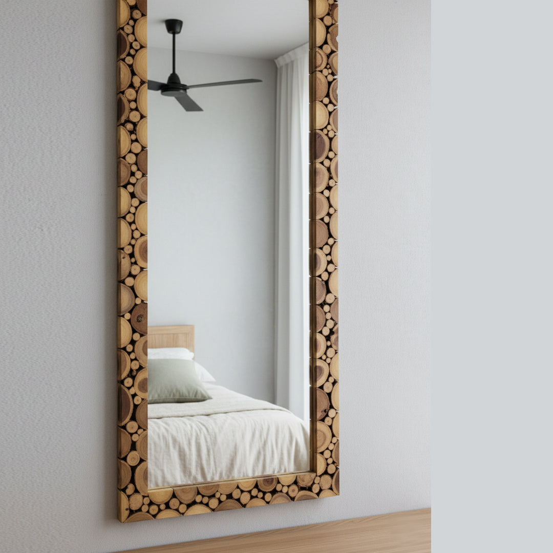 Close-up of the Adooch teak wood slice mirror frame showing natural wood grain and texture.